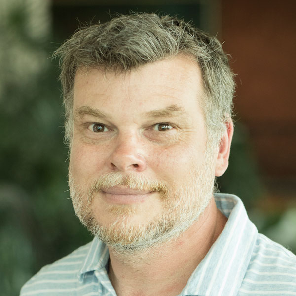 A headshot of a man