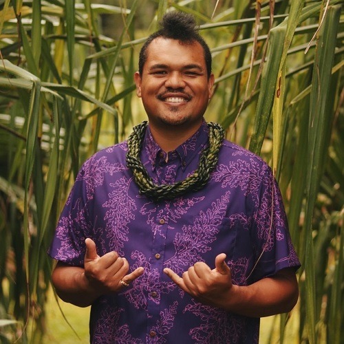 A headshot of Brandon Makaawaawa