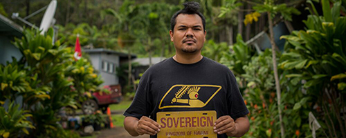 A man holding a sign