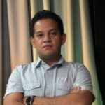 headshot of Eduardo Jose Tome