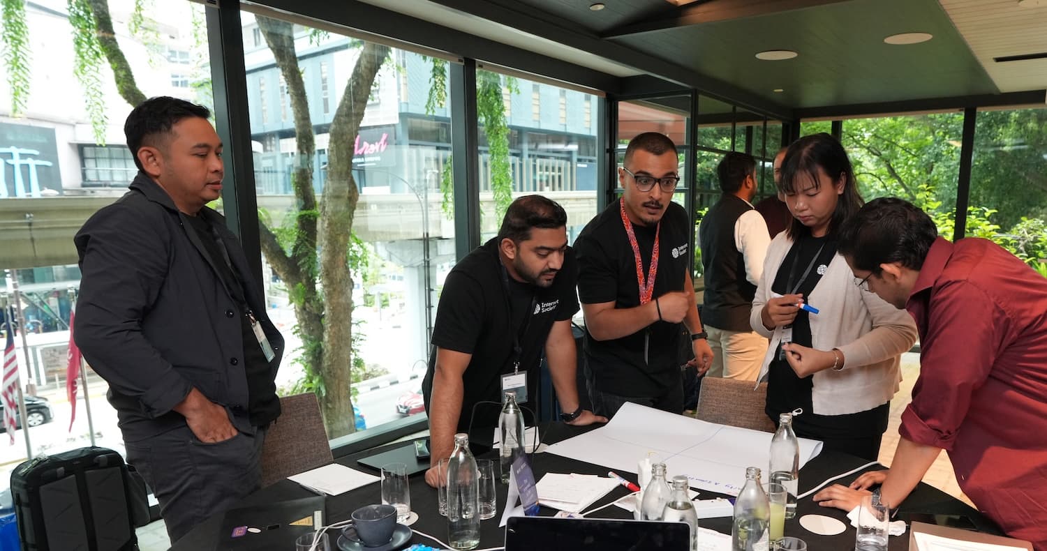 A diverse group of people collaborating around a table